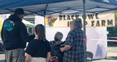 Answering Customer Questions at the Newberg Farmers Market